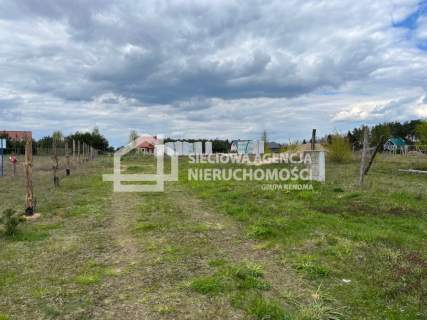 Działka z rozpoczętą budową 130 m od jeziora.