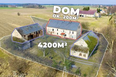 Dom z dużą działką i budynkami gospodarczymi
