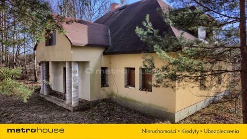Dworek z potencjałem na dużej działce w Modlicy