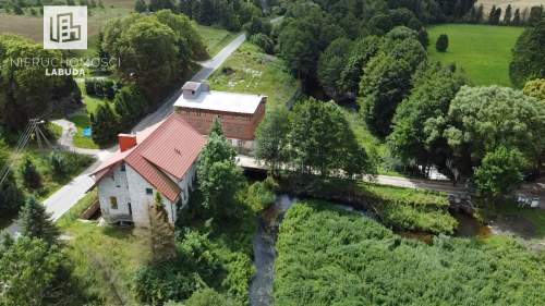 Dom z dużą działką bezpośrednio nad rzeką