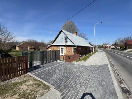 Drewniany dom na działce w Świeciechowie Dużym.