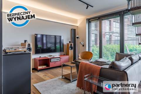 Dwupoziomowy apartament z ogrodem