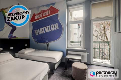Działający, 11-pokojowy hostel w centrum miasta 
