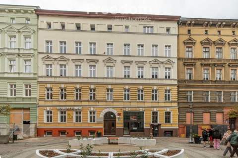 Jako mieszkanie lub lokal przy Deptaku Bogusława