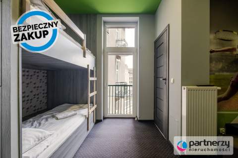 Działający, 11-pokojowy hostel w centrum miasta 