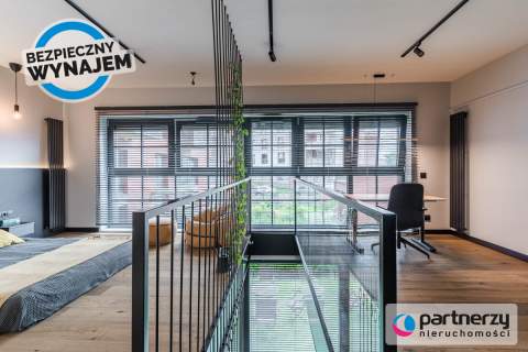 Dwupoziomowy apartament z ogrodem