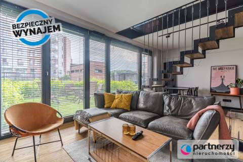 Dwupoziomowy apartament z ogrodem