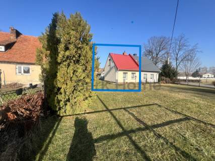 Lokal mieszkalny z ogródkiem. i pom. gospodarczym.
