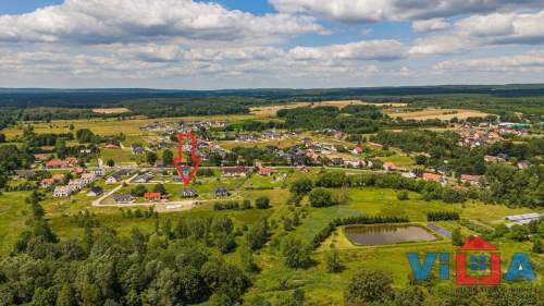 PRZESTRONNY DOM Z GARAŻEM NA SPOREJ DZIAŁCE