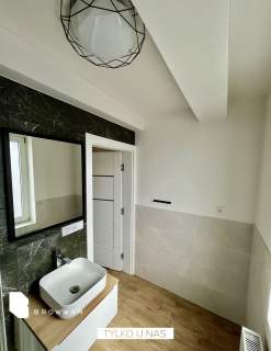 Mieszkanie dwukondygnacyjne nieopodal Parku Arena