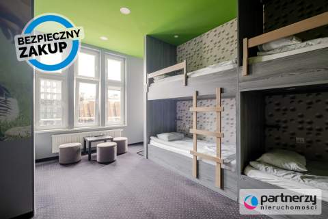 Działający, 11-pokojowy hostel w centrum miasta 