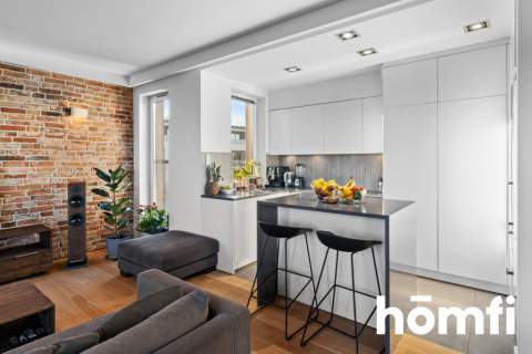 Przestronny apartament na ostatnim piętrze 