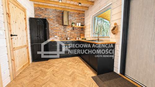 Dom drewniany nad morzem