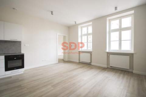 Przestronne mieszkanie w odnowionej kamienicy Warszawska 35 52m2