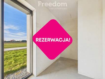Nowoczesny dom z garażem i ogrodem.