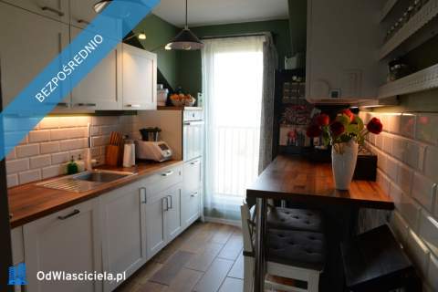 Dwupoziomowe strych z balkonem i 2 miejsca postojowe w cenie
