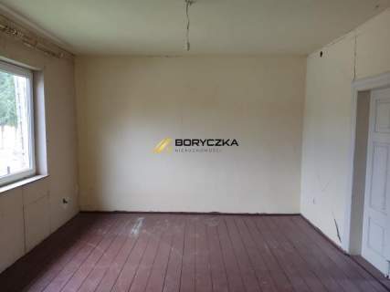 Urokliwy drewniany dom w Starym Korczynie.