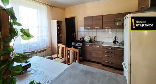 Dom przy starym młynie z widokiem na staw