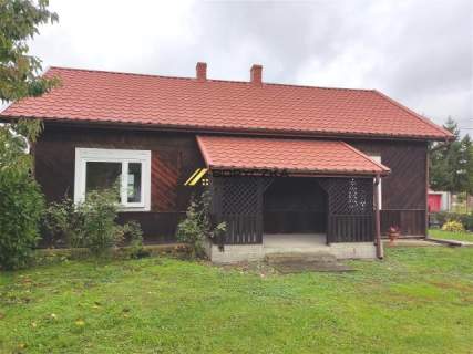 Urokliwy drewniany dom w Starym Korczynie.