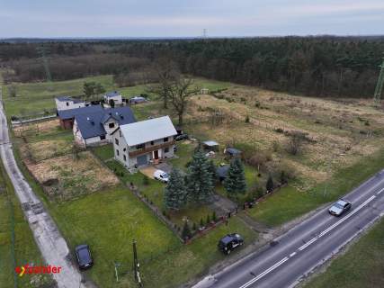 Dom z pięknym ogrodem i dużym garażem - Korzonek