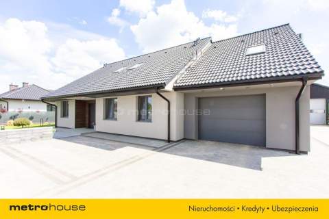 Nowoczesny dom z dużą działką w Marcelinie