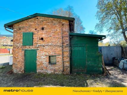 Połowa domu położona pod lasem w Jugowie