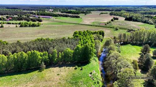 Wyjątkowa działka nad rzeką i z własnym lasem.