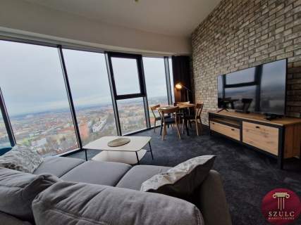 Na wynajem komfortowy apartament w sercu miasta.