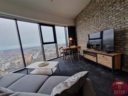 Na wynajem komfortowy apartament w sercu miasta.