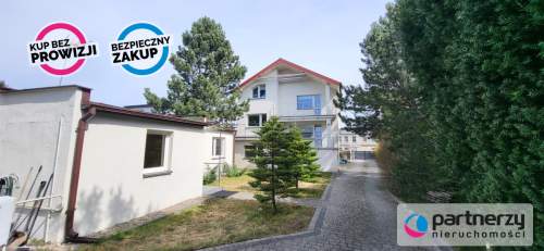 Dom podzielony na 2 mieszkania oraz dom w ogrodzie