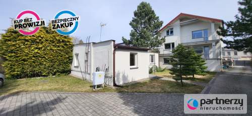 Dom podzielony na 2 mieszkania oraz dom w ogrodzie