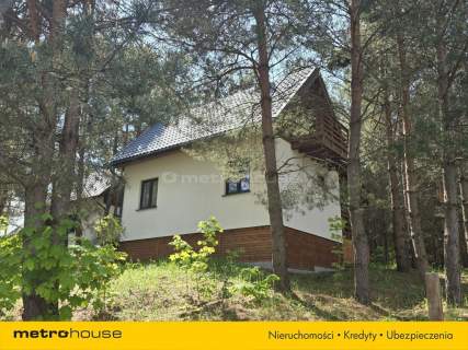 Dom w pięknej okolicy nad cichym jeziorem