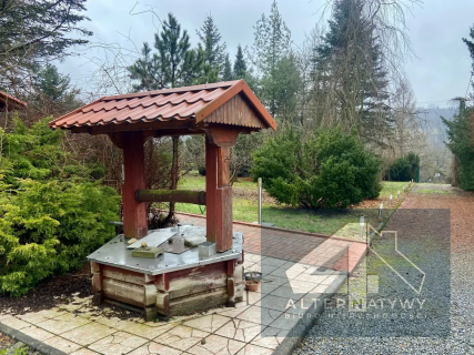 Dom z bali na dużej działce 0,5 ha 