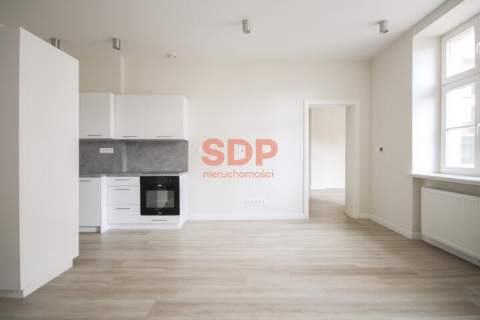 Przestronne mieszkanie w odnowionej kamienicy Warszawska 35 52m2