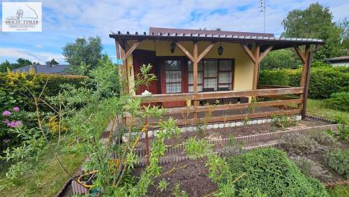 107000 DOM ROD 25/300 m2 dom nad jeziorem 