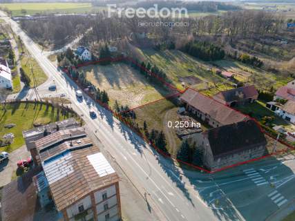 Na sprzedaż działka usługowa 25 ar z zabudowaniami