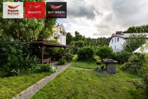 Dwupoziomowe przestronne mieszkanie z garażem