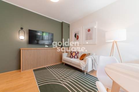 Designerski Apartament z Garażem w Pięknej Okolicy