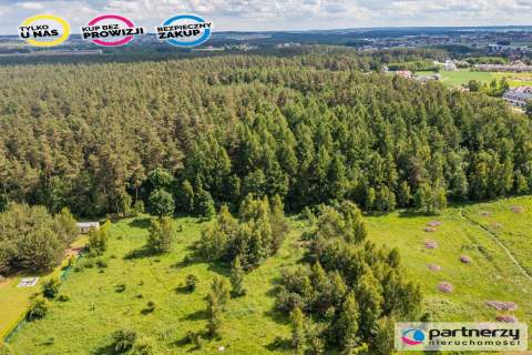 Piękna działka pod lasem 2257 m2 z wydaną WZKą .
