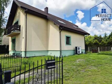 Przestronny dom z funkcjonalnym układem Fotowoltaika Pompa