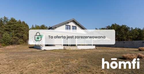 Nowoczesny dom przy lesie z prywatnym stawem
