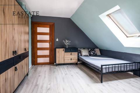 Dom przy lesie z bali z dużą działką