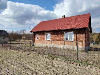 Sprzedam dom na działce o powierzchni 16ar tel .