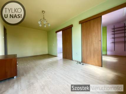 M. w ładnym bloku na pełnym zieleni Rakowie
