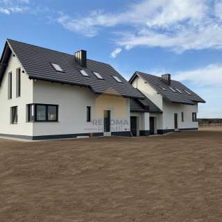 Dom w zabudowie bliźniaczej w Milikowicach