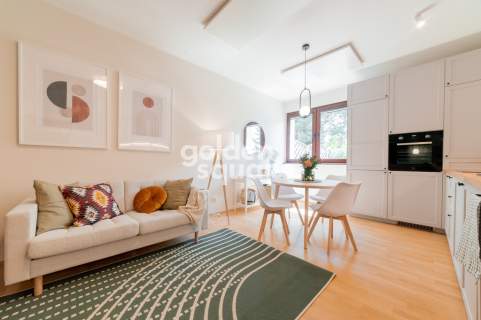Designerski Apartament z Garażem w Pięknej Okolicy