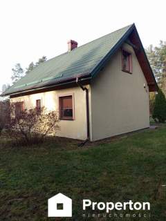 Dom w otoczeniu lasów/ Działka 32 arów