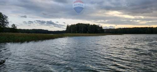 Działka budowlana z linią brzegową, Skolity