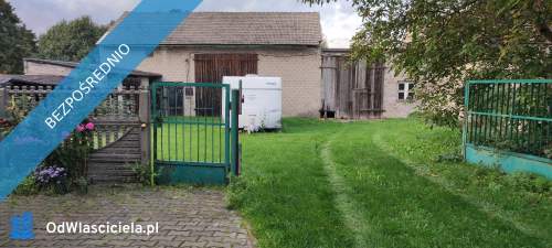 Dom z cegły z dużą działką budynki gospodarcze