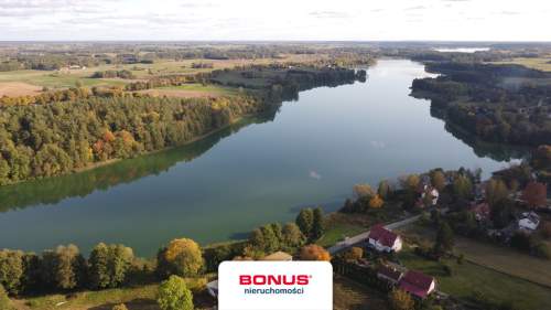 Działka z projektem domu i udziałem w plaży.